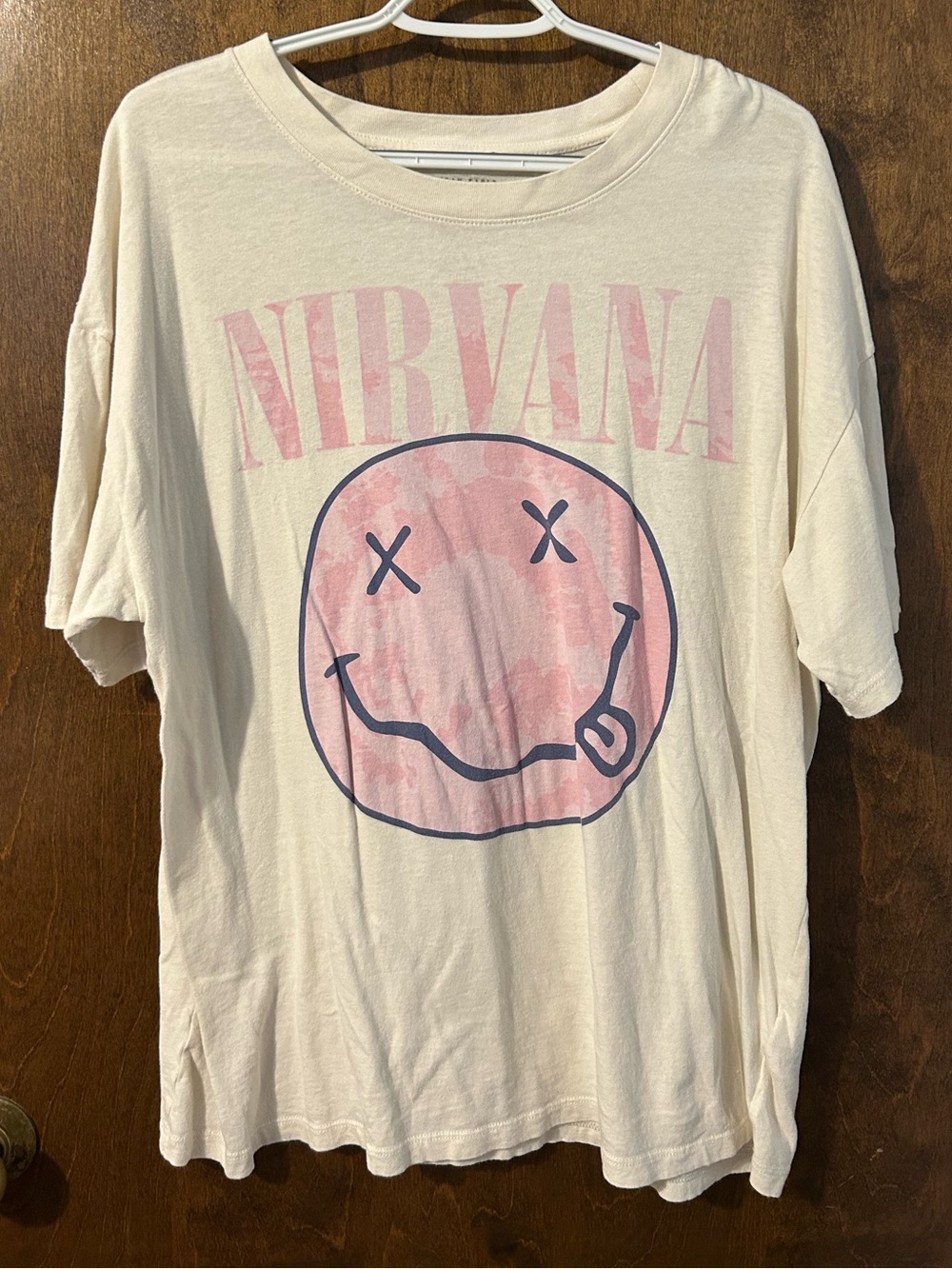 American Eagle NIRVANA Cream Tee with Pink Smiley Graphic